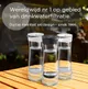 Drie BRITA karaffen in verschillende kleuren op tafel, tekst over wereldwijd nummer 1 in drinkwaterfiltratie